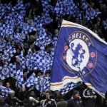 Chelsea fans wave flags ahead of the UEF